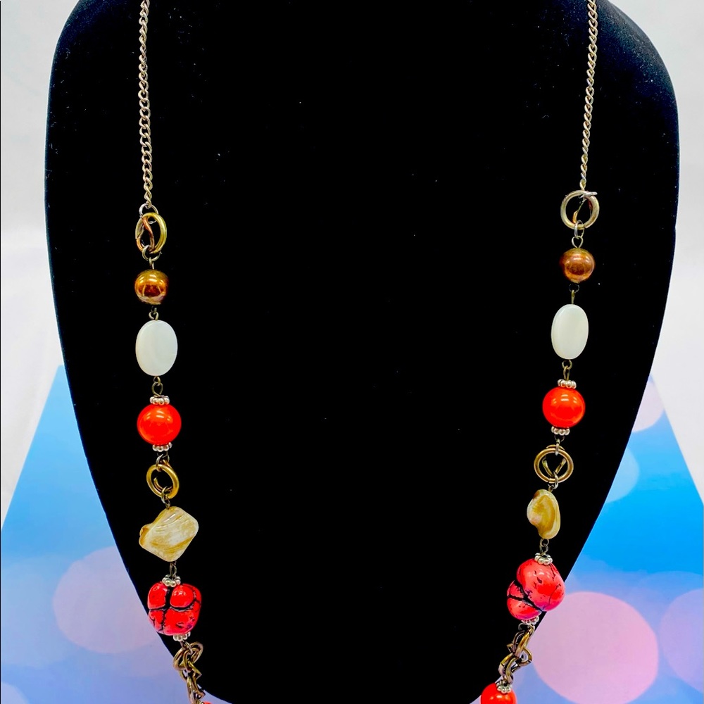 Long salmon color necklace